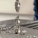 Drilling metal